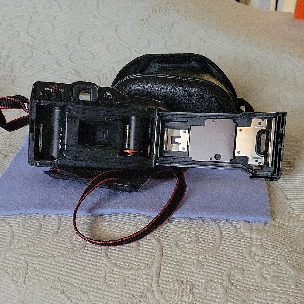 Canon Vintage Black Film Camera with Red Accents